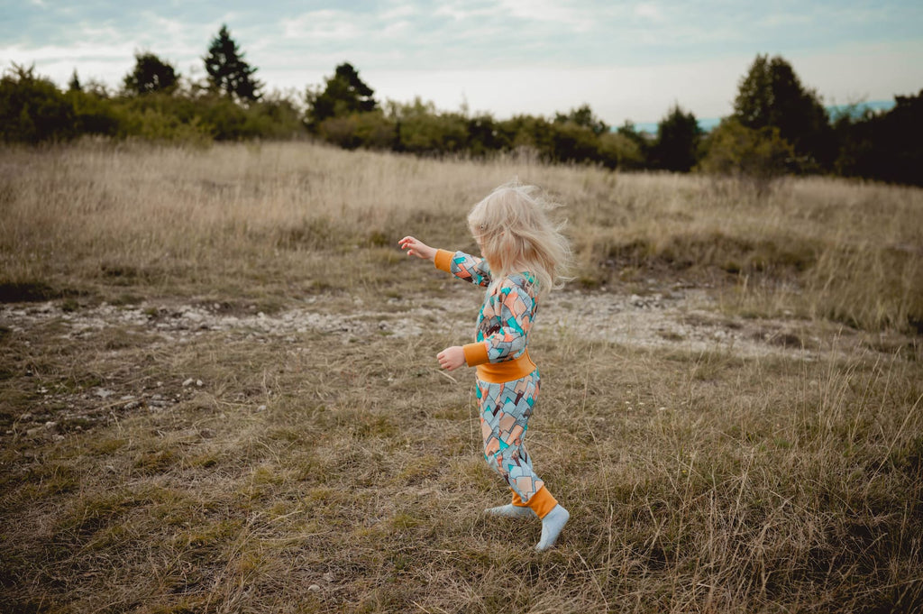 Merino Strampler – Bunte Berge